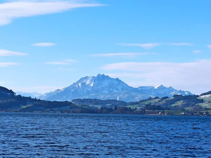 A view over Lake Zug to Mount Pilatus this Friday morning. The Pilatus is a mountain range in central Switzerland south of the City of Lucerne. The highest point of the mountain is the Tomlishorn with a height of 2128 meters above sea level.